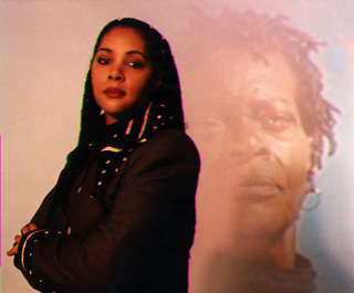 Director Julie Dash in front of an image from her film Daughters of the DustIMDb